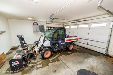 This beautiful single-level home sits on the Priest Lake Golf on Priest Lake Golf and Tennis Club in Idaho - for sale on GolfHomes.com, golf home, golf lot