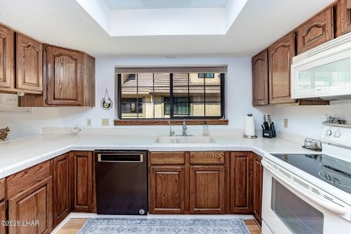 This lovely condo is located by the lakeside and is just a short on London Bridge Golf Course in Arizona - for sale on GolfHomes.com, golf home, golf lot