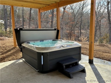 Experience unparalleled luxury living at the Estates of on The Club At Old Kinderhook in Missouri - for sale on GolfHomes.com, golf home, golf lot