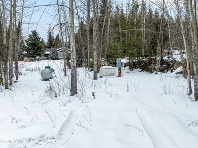 This beautiful single-level home sits on the Priest Lake Golf on Priest Lake Golf and Tennis Club in Idaho - for sale on GolfHomes.com, golf home, golf lot