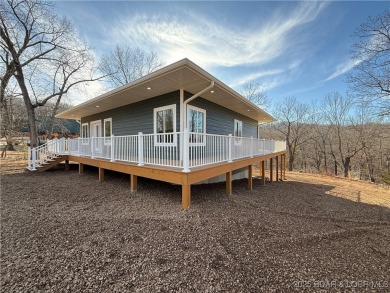 Experience unparalleled luxury living at the Estates of on The Club At Old Kinderhook in Missouri - for sale on GolfHomes.com, golf home, golf lot