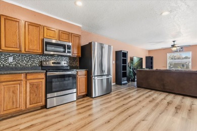 Welcome to 39560 Meadowood Loop, a charming 3-bedroom, 2-bath on Zephyrhills Municipal Golf Course in Florida - for sale on GolfHomes.com, golf home, golf lot