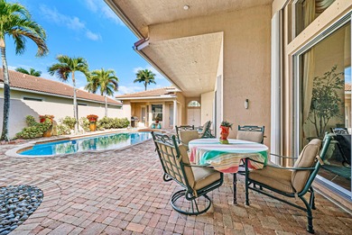 Exceptional courtyard estate perfectly positioned on a premium on  in Florida - for sale on GolfHomes.com, golf home, golf lot