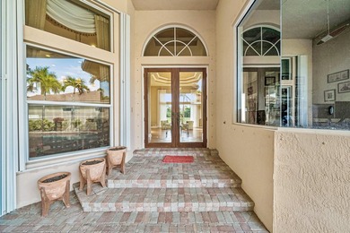 Exceptional courtyard estate perfectly positioned on a premium on Frenchmans Reserve in Florida - for sale on GolfHomes.com, golf home, golf lot