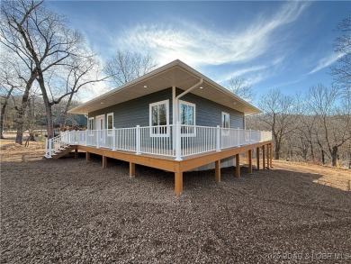 Experience unparalleled luxury living at the Estates of on The Club At Old Kinderhook in Missouri - for sale on GolfHomes.com, golf home, golf lot