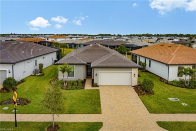 This elegant 3-bedroom, 3-bath home in the highly sought-after on Valencia Golf and Country Club in Florida - for sale on GolfHomes.com, golf home, golf lot