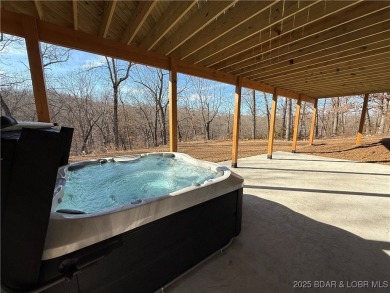 Experience unparalleled luxury living at the Estates of on The Club At Old Kinderhook in Missouri - for sale on GolfHomes.com, golf home, golf lot