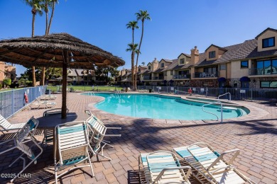 This lovely condo is located by the lakeside and is just a short on London Bridge Golf Course in Arizona - for sale on GolfHomes.com, golf home, golf lot