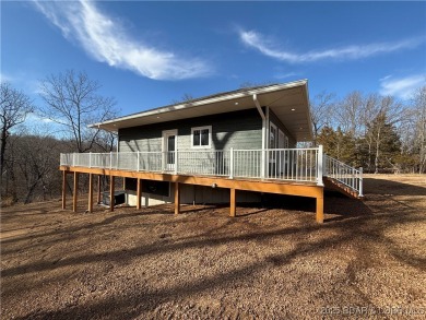 Experience unparalleled luxury living at the Estates of on The Club At Old Kinderhook in Missouri - for sale on GolfHomes.com, golf home, golf lot