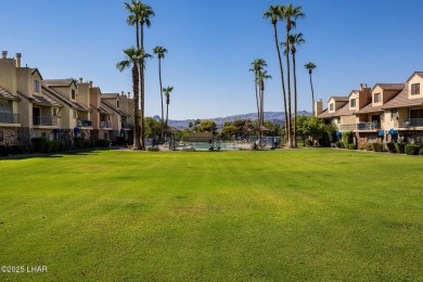This lovely condo is located by the lakeside and is just a short on London Bridge Golf Course in Arizona - for sale on GolfHomes.com, golf home, golf lot