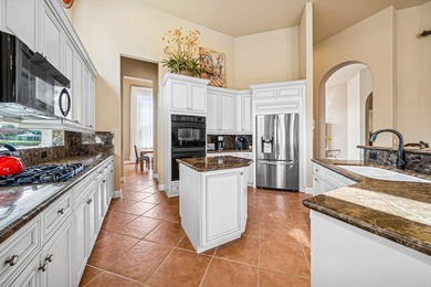 Exceptional courtyard estate perfectly positioned on a premium on Frenchmans Reserve in Florida - for sale on GolfHomes.com, golf home, golf lot