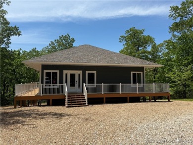 Experience unparalleled luxury living at the Estates of on The Club At Old Kinderhook in Missouri - for sale on GolfHomes.com, golf home, golf lot