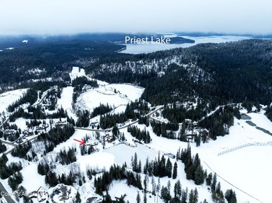 This beautiful single-level home sits on the Priest Lake Golf on Priest Lake Golf and Tennis Club in Idaho - for sale on GolfHomes.com, golf home, golf lot