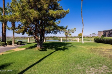 This lovely condo is located by the lakeside and is just a short on London Bridge Golf Course in Arizona - for sale on GolfHomes.com, golf home, golf lot