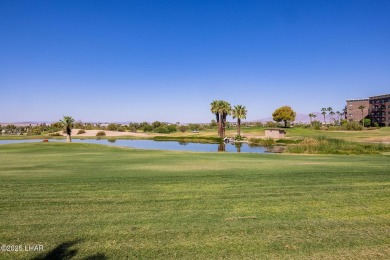 This lovely condo is located by the lakeside and is just a short on London Bridge Golf Course in Arizona - for sale on GolfHomes.com, golf home, golf lot