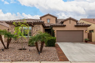 This well-appointed home pairs refined interior finishes with on The Golf Club At Johnson Ranch in Arizona - for sale on GolfHomes.com, golf home, golf lot
