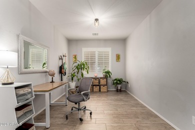 This well-appointed home pairs refined interior finishes with on The Golf Club At Johnson Ranch in Arizona - for sale on GolfHomes.com, golf home, golf lot