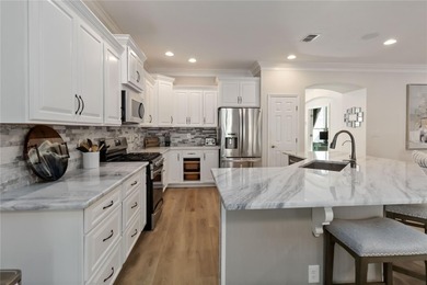 Location is everything, and this exceptional home delivers with on Victoria Hills Golf Club in Florida - for sale on GolfHomes.com, golf home, golf lot