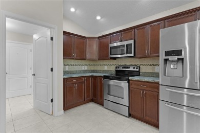 Discover the epitome of modern living in this meticulously cared on Glenview Championship Golf and Country Club in Florida - for sale on GolfHomes.com, golf home, golf lot