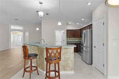 Discover the epitome of modern living in this meticulously cared on Glenview Championship Golf and Country Club in Florida - for sale on GolfHomes.com, golf home, golf lot
