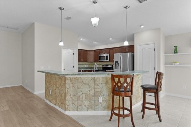 Discover the epitome of modern living in this meticulously cared on Glenview Championship Golf and Country Club in Florida - for sale on GolfHomes.com, golf home, golf lot