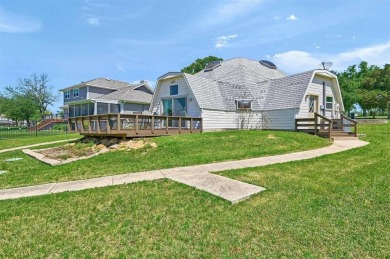 Unique lakefront home with nice updates, two bedrooms and  2 on Lake Kiowa Golf Course in Texas - for sale on GolfHomes.com, golf home, golf lot