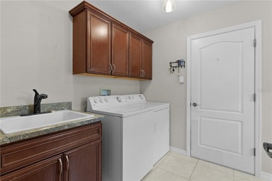 Discover the epitome of modern living in this meticulously cared on Glenview Championship Golf and Country Club in Florida - for sale on GolfHomes.com, golf home, golf lot