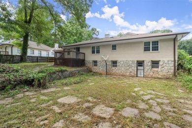 Charming 4-sided brick ranch with a basement in Cascade Heights! on Alfred Tup Holmes Golf Course in Georgia - for sale on GolfHomes.com, golf home, golf lot