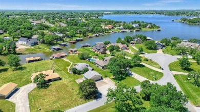 Unique lakefront home with nice updates, two bedrooms and  2 on Lake Kiowa Golf Course in Texas - for sale on GolfHomes.com, golf home, golf lot