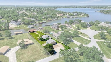 Unique lakefront home with nice updates, two bedrooms and  2 on Lake Kiowa Golf Course in Texas - for sale on GolfHomes.com, golf home, golf lot