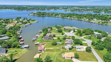Unique lakefront home with nice updates, two bedrooms and  2 on Lake Kiowa Golf Course in Texas - for sale on GolfHomes.com, golf home, golf lot