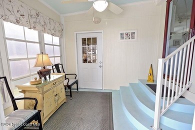 2bed/2bath home with a lovely golf course view in Barefoot Bay! on Barefoot Bay Golf Course in Florida - for sale on GolfHomes.com, golf home, golf lot