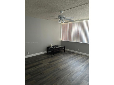 **SPACIOUS AND BRIGHT 3/2 - COMPLETELY RENOVATED FIRST FLOOR on Inverrary Country Club in Florida - for sale on GolfHomes.com, golf home, golf lot
