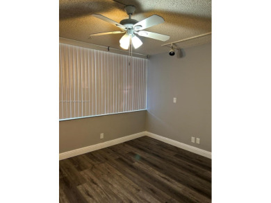 **SPACIOUS AND BRIGHT 3/2 - COMPLETELY RENOVATED FIRST FLOOR on Inverrary Country Club in Florida - for sale on GolfHomes.com, golf home, golf lot