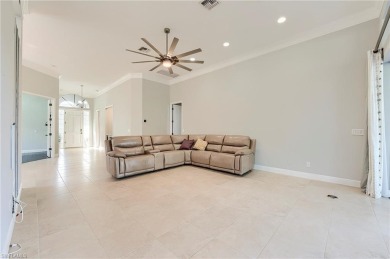 Experience breathtaking sunsets with sweeping water and golf on Estero Country Club in Florida - for sale on GolfHomes.com, golf home, golf lot