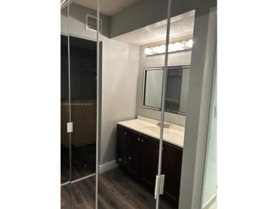 **SPACIOUS AND BRIGHT 3/2 - COMPLETELY RENOVATED FIRST FLOOR on Inverrary Country Club in Florida - for sale on GolfHomes.com, golf home, golf lot
