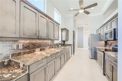 Experience breathtaking sunsets with sweeping water and golf on Estero Country Club in Florida - for sale on GolfHomes.com, golf home, golf lot