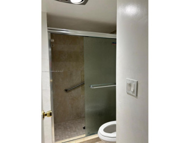 **SPACIOUS AND BRIGHT 3/2 - COMPLETELY RENOVATED FIRST FLOOR on Inverrary Country Club in Florida - for sale on GolfHomes.com, golf home, golf lot