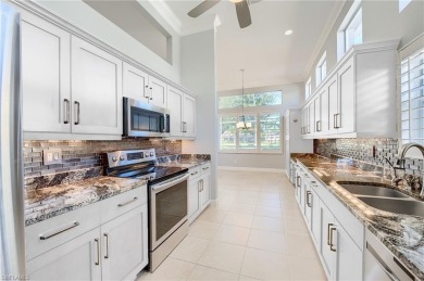 Experience breathtaking sunsets with sweeping water and golf on Estero Country Club in Florida - for sale on GolfHomes.com, golf home, golf lot