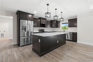 Enjoy the difference that award-winning quality makes in this on Citrus Springs Country Club in Florida - for sale on GolfHomes.com, golf home, golf lot
