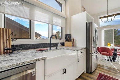 Experience turn-key, main-level living in the gated Kissing on Kissing Camels Golf Course in Colorado - for sale on GolfHomes.com, golf home, golf lot