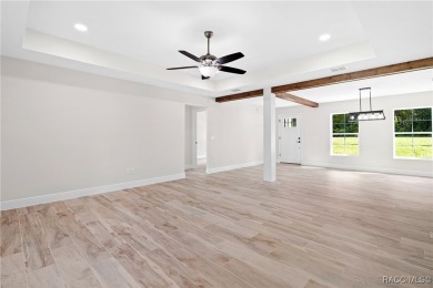 Enjoy the difference that award-winning quality makes in this on Citrus Springs Country Club in Florida - for sale on GolfHomes.com, golf home, golf lot