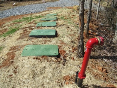 Newly platted Lot 2 in Mill Creek offers a flat building pad on Mill Creek Country Club in North Carolina - for sale on GolfHomes.com, golf home, golf lot