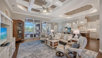 Positioned on a premier homesite with water on two sides and on Ritz-Carlton Members Golf Club in Florida - for sale on GolfHomes.com, golf home, golf lot