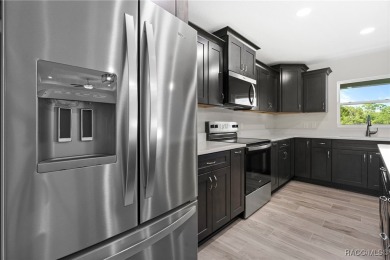 Enjoy the difference that award-winning quality makes in this on Citrus Springs Country Club in Florida - for sale on GolfHomes.com, golf home, golf lot