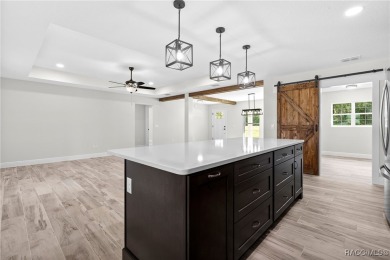 Enjoy the difference that award-winning quality makes in this on Citrus Springs Country Club in Florida - for sale on GolfHomes.com, golf home, golf lot