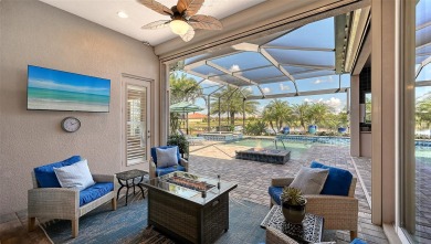 Positioned on a premier homesite with water on two sides and on Ritz-Carlton Members Golf Club in Florida - for sale on GolfHomes.com, golf home, golf lot