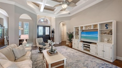 Positioned on a premier homesite with water on two sides and on Ritz-Carlton Members Golf Club in Florida - for sale on GolfHomes.com, golf home, golf lot