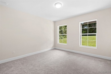 Enjoy the difference that award-winning quality makes in this on Citrus Springs Country Club in Florida - for sale on GolfHomes.com, golf home, golf lot
