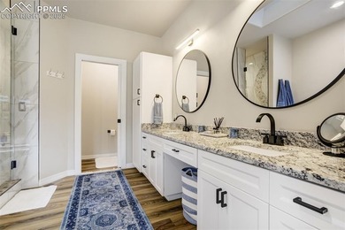 Experience turn-key, main-level living in the gated Kissing on Kissing Camels Golf Course in Colorado - for sale on GolfHomes.com, golf home, golf lot